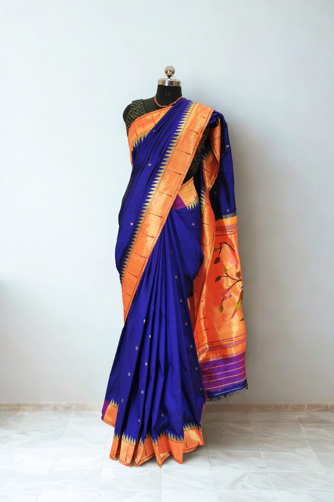 Navy blue muniya border silk paithani saree with rich pallu