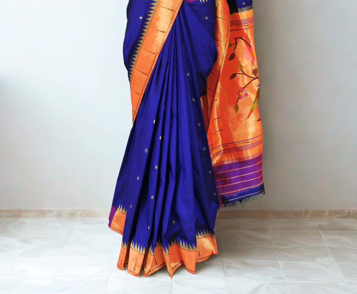 Navy blue muniya border silk paithani saree with rich pallu