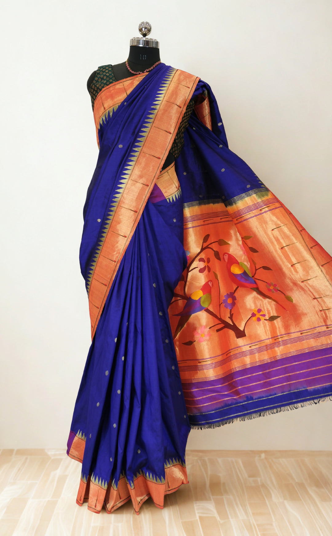 Navy blue muniya border silk paithani saree with rich pallu