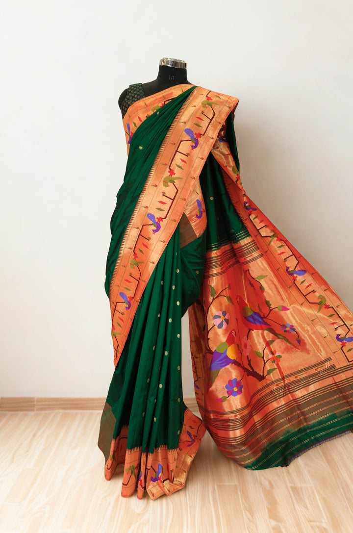 Bottle green parrot and peacock border silk paithani