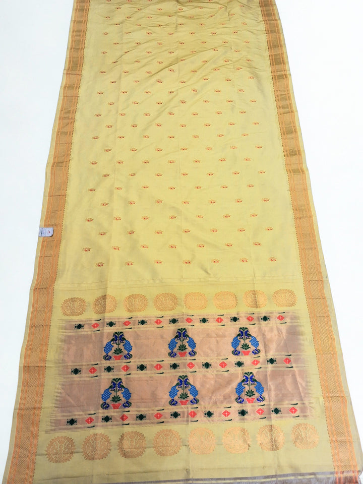 Butterscotch yellow peacock butti silk paithani saree