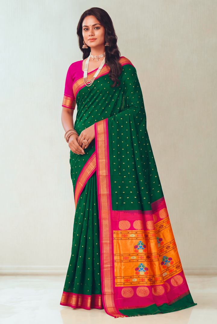 Bottle green silk paithani saree with pink border