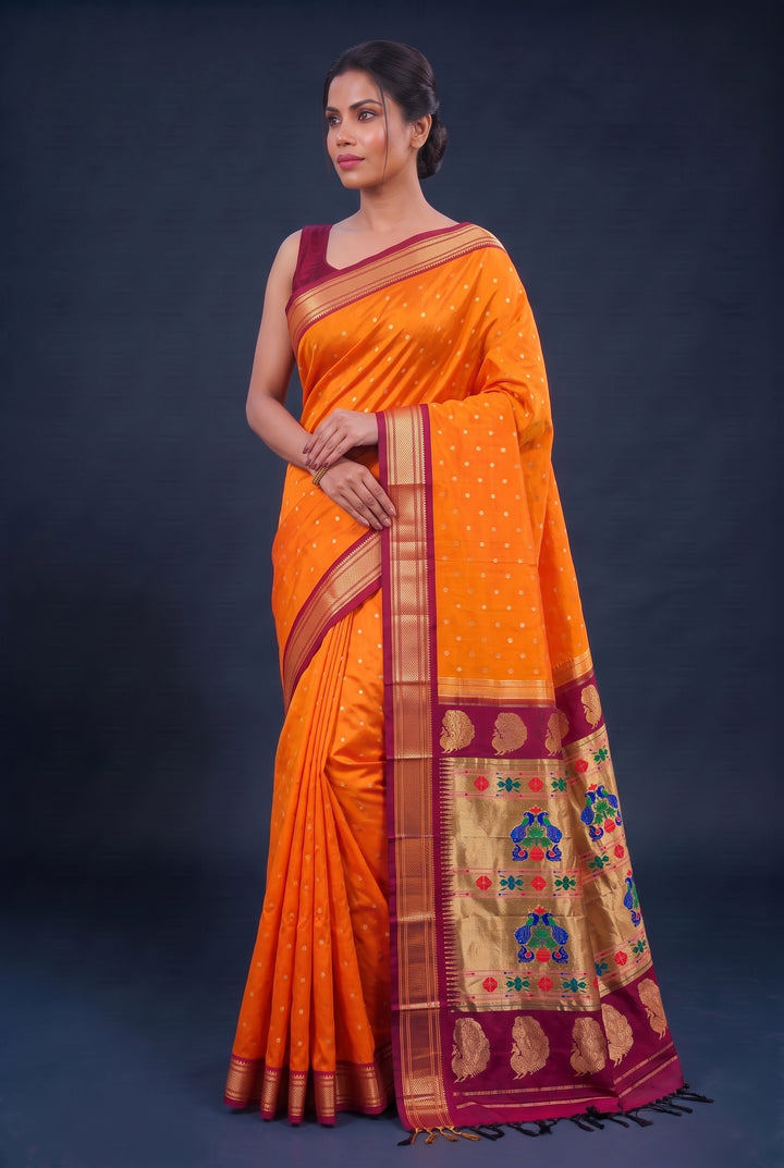 Mustard yellow silk paithani saree with maroon border