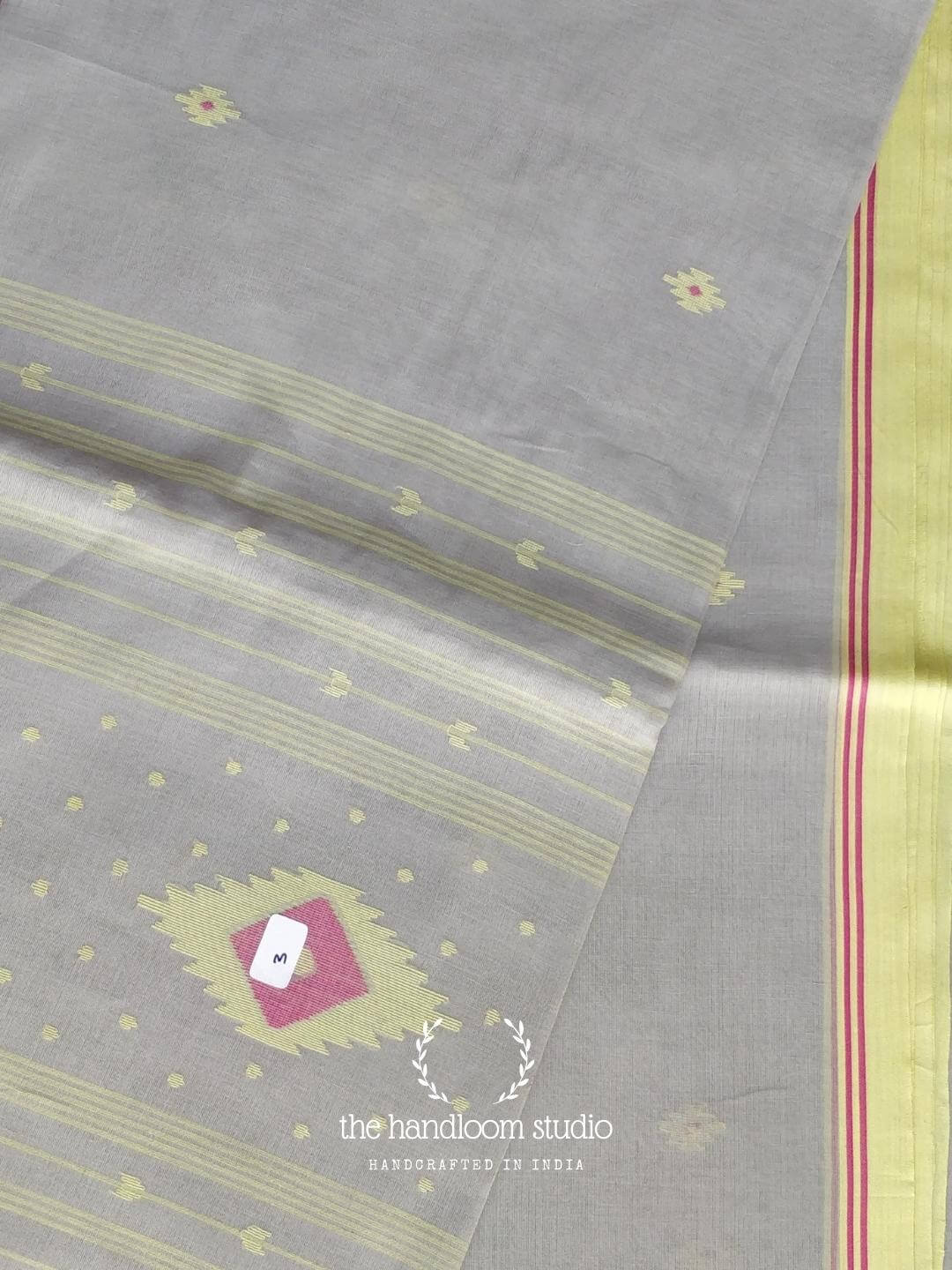 Grey cotton jamdani saree with pale yellow border