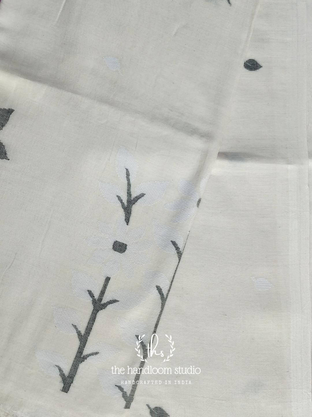 Offwhite jamdani cotton saree with flower design on pallu