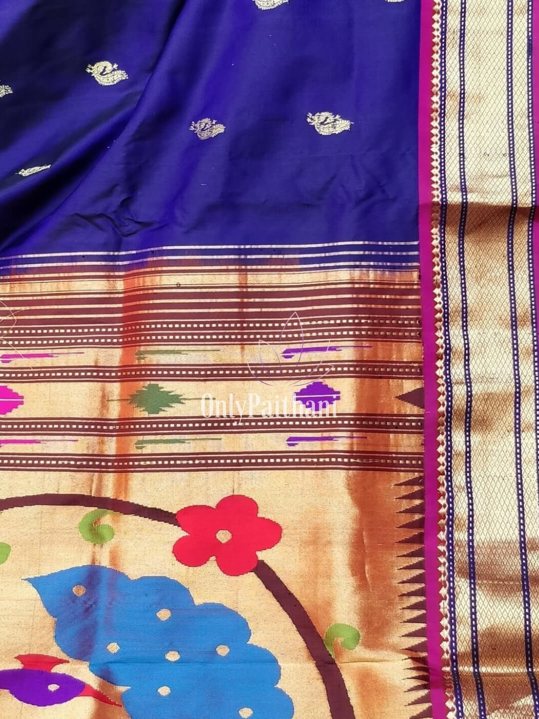 Blue rich pallu silk paithani with pink border and peacock butti
